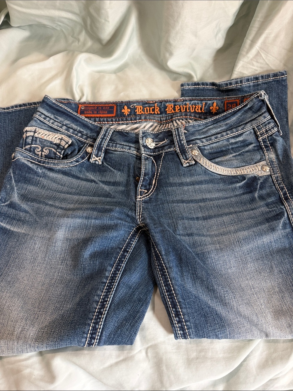 Rock Revival Women's Faded Blue Cropped Jeans with White Contrast Stitching